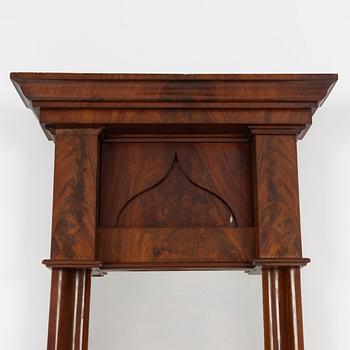 An Empire mirror, first half of the 20th Century.