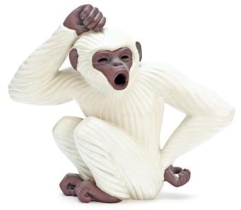 383. A Gunnar Nylund stoneware figure of an ape, Rörstrand.