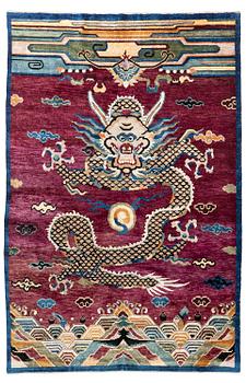 960. A Chinese silk and metal-thread 'Dragon' pillar rug, Bejing, North China, around 1910, c. 234x151 cm.