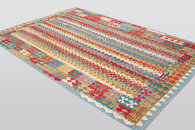A carpet, kilim, ca 294 x 197 cm.