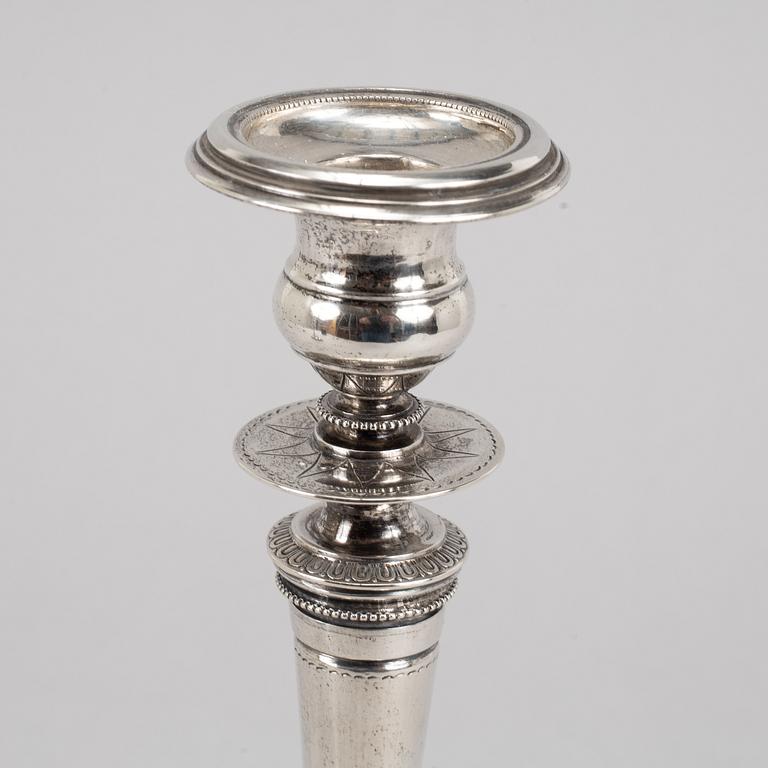 A pair of swedish silver candlesticks, mark of Guldsmedsaktiebolaget GAB, Stockholm 1882.