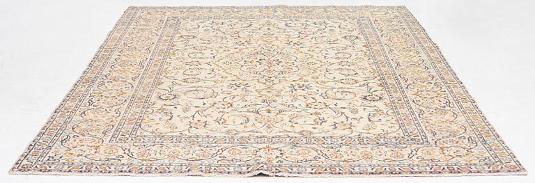 A carpet, Keshan, c. 306 x 214 cm.