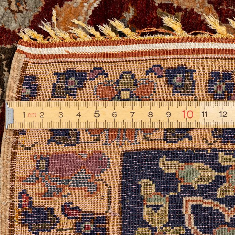 An antique silk rug, probably Istanbul, Turkey, c. 181 x 127 cm.