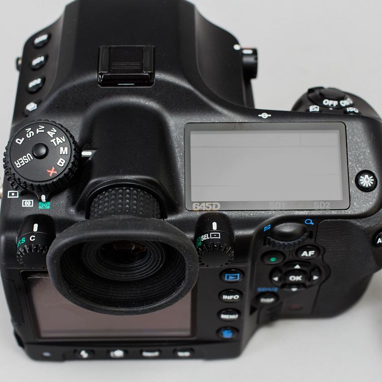 A black body medium format Pentax 645D camera with a SMC Pentax-D FA 645 55mm F2.8 AL [IF] SDM AW lens.