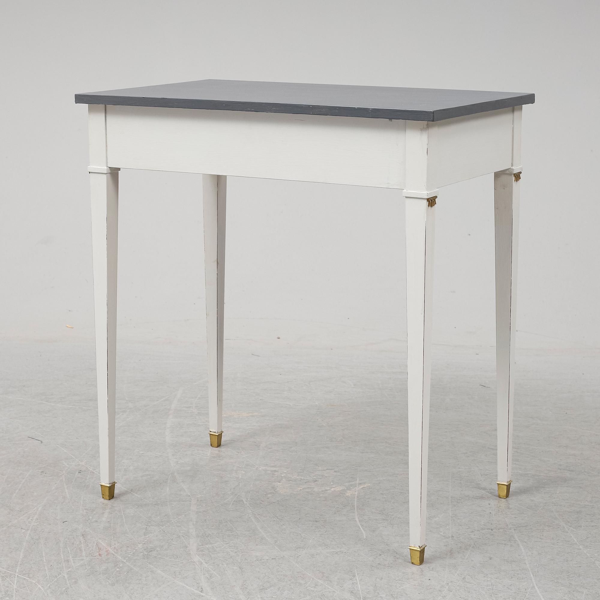 A Gustavian style table, first half of the 20th century.