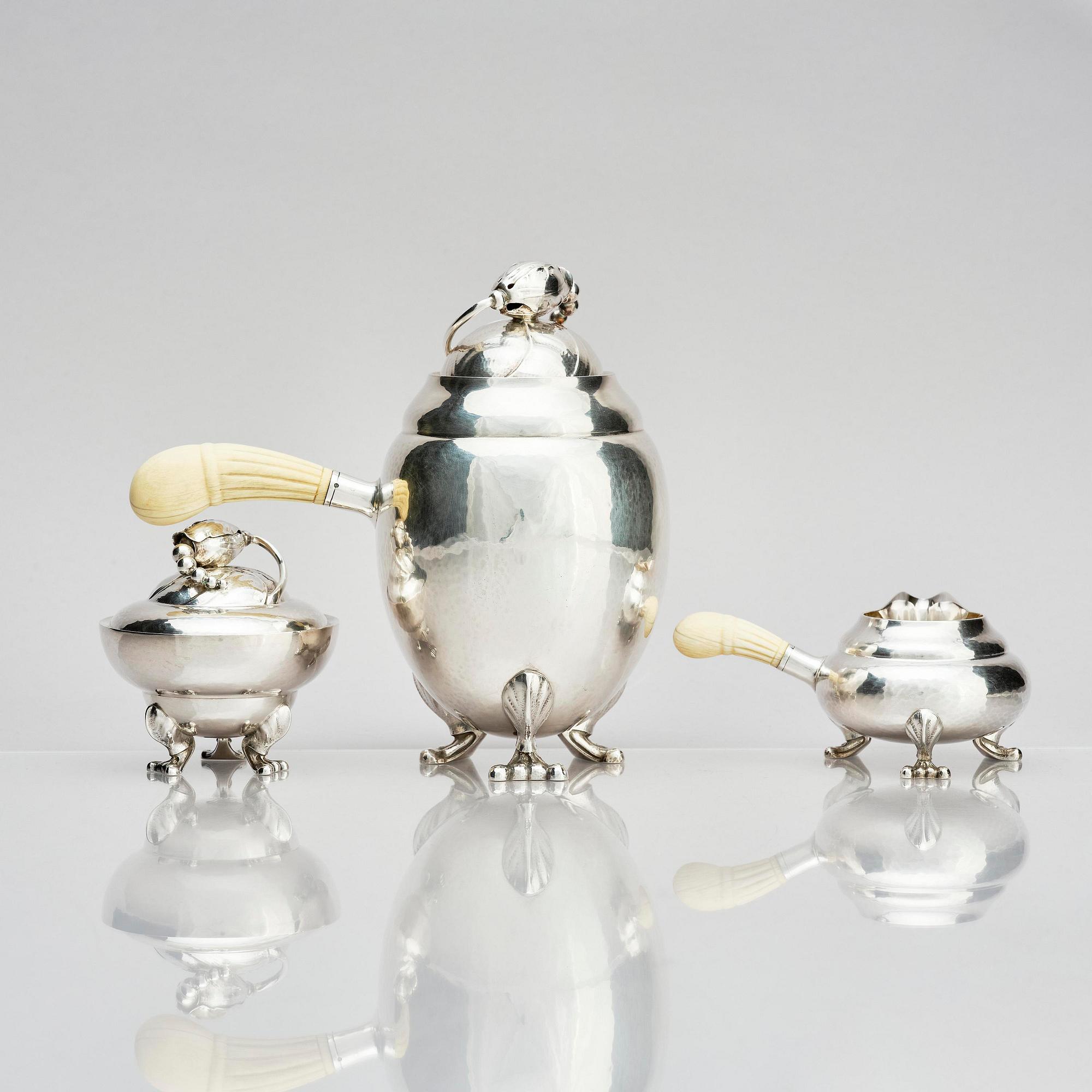Georg Jensen, a three pieces coffee service in sterling silver, "Magnolia/Blossom", Copenhagen 1933-44.