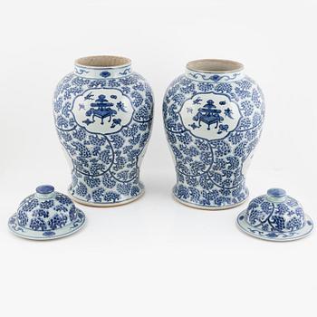 A pair of blue and white porcelain floor urns, China, 20th century.