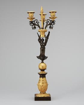 An Empire three-light gilt bronze candelabra.