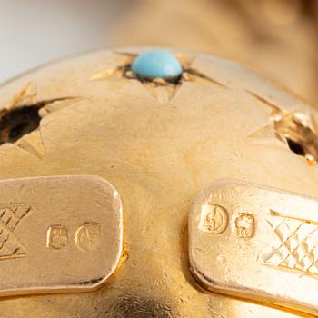 Armband, 18K guld med två stora berlocker.