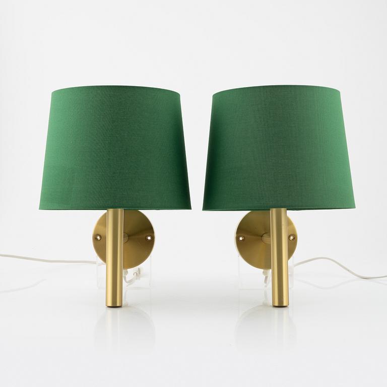 Uno & Östen Kristiansson, a pair of brass wall lights, Luxus, Vittsjö.