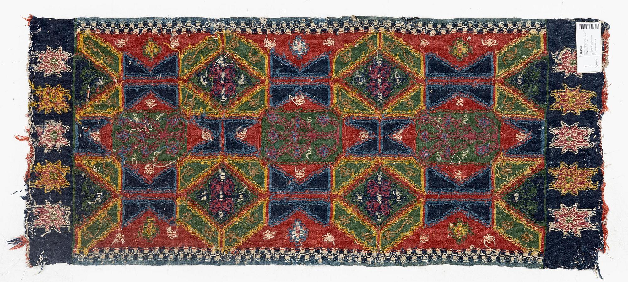 A carriage cushion, double-interlocked tapestry, c. 102 x 48 cm, Scania, Sweden, last quarter of the 18th century.