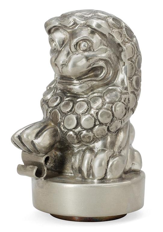 An Anna Petrus pewter and brass seal by Svenskt Tenn 1981.