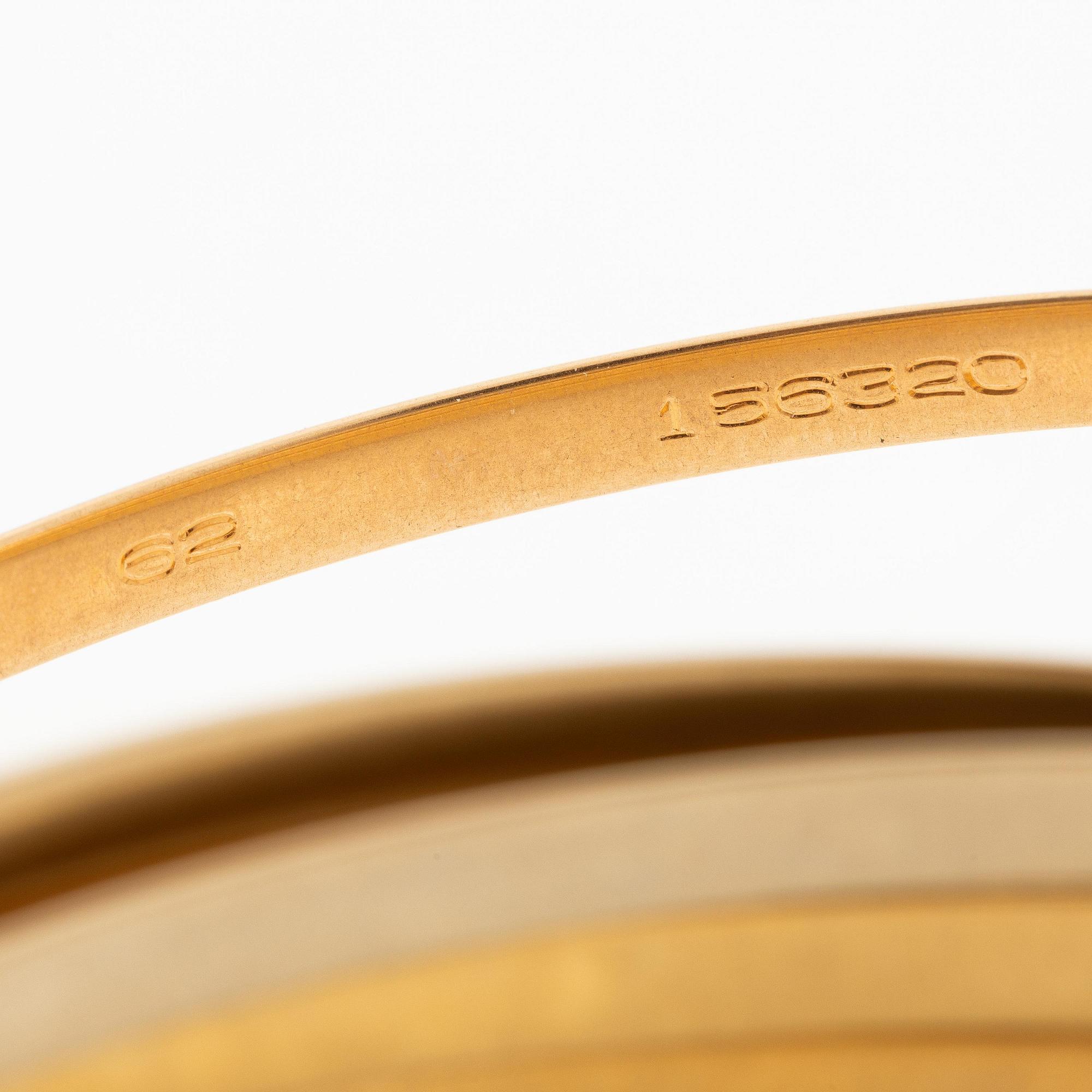 A Cartier bangle "Trinity" 18K gold in three colours.