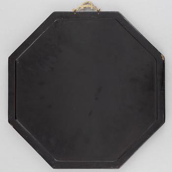 Four black-lacquered wall decorations, China, around 1900.