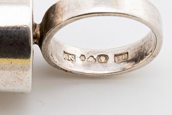 2 RINGS, 18K gold w smoky quartz approx 14 mm, silver and gold w rock crystal approx 16 mm, Stockholm 1963.