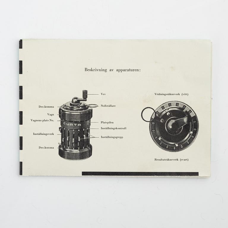 A Curta Type I mechanical calculator.