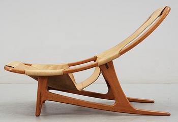 An Arne Tidemand Ruud teak and leather easy chair, by Norcraft,