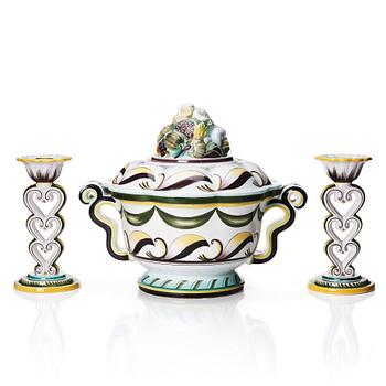 Arthur Percy, a Swedish Grace  lidded faience bowl and a pair of candlesticks,  Gefle Porslinsfabrik 1920s-1930s.