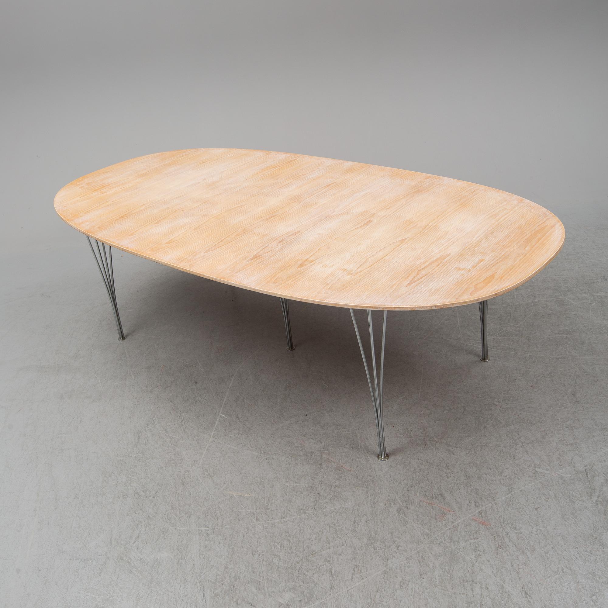 BRUNO MATHSSON & PIET HEIN, a 'Superellips' dining table, Fritz Hansen, Denmark, 1994.