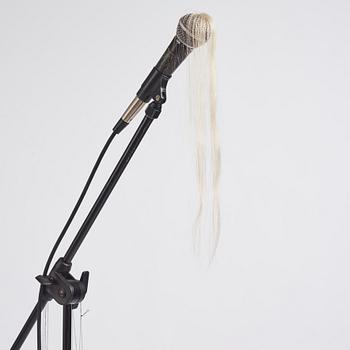 Leif Holmstrand, executed in 2009. Mic, hair, jeans fabric, thread, safety pins.