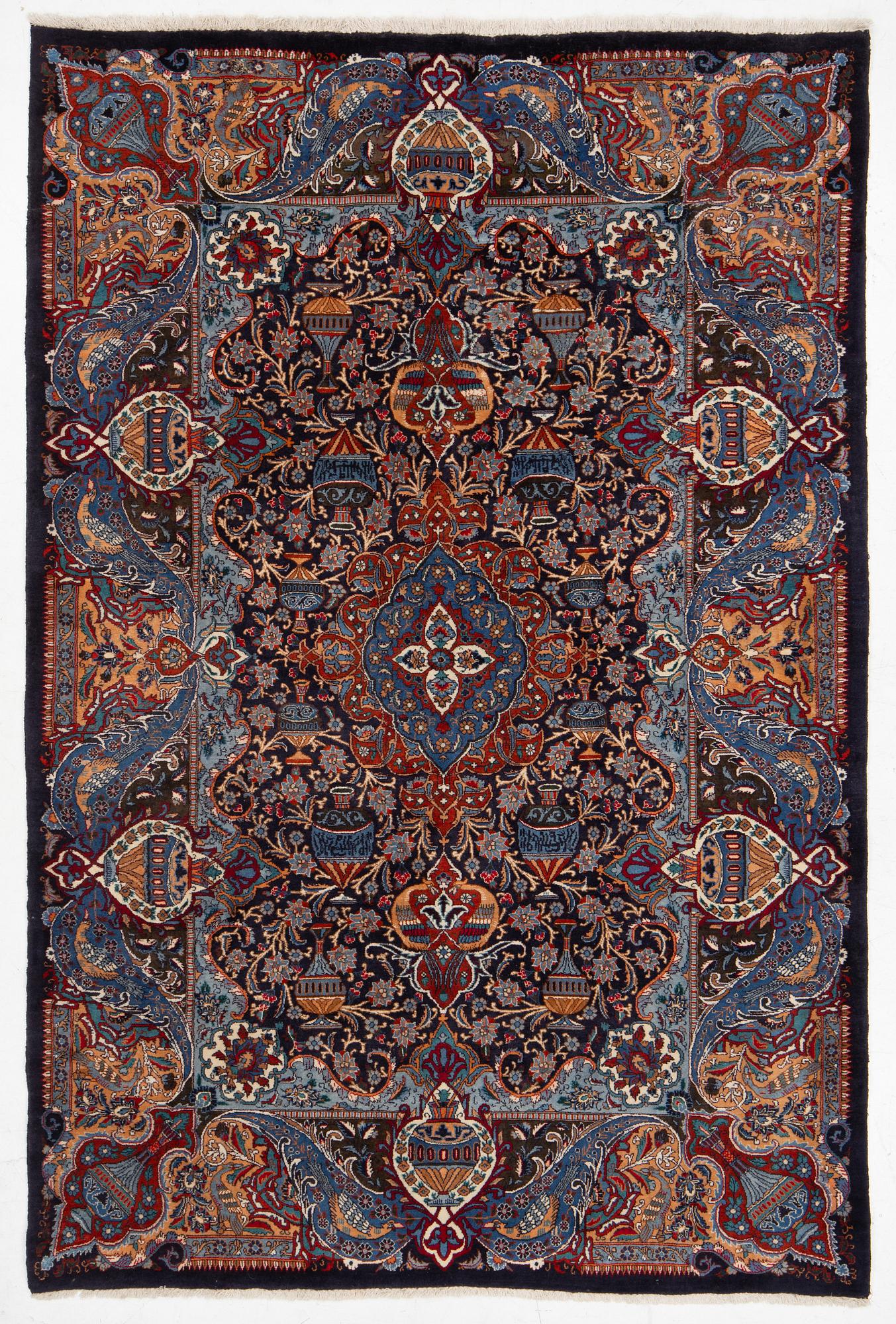 A Kashmar carpet, c. 295 x 198 cm.