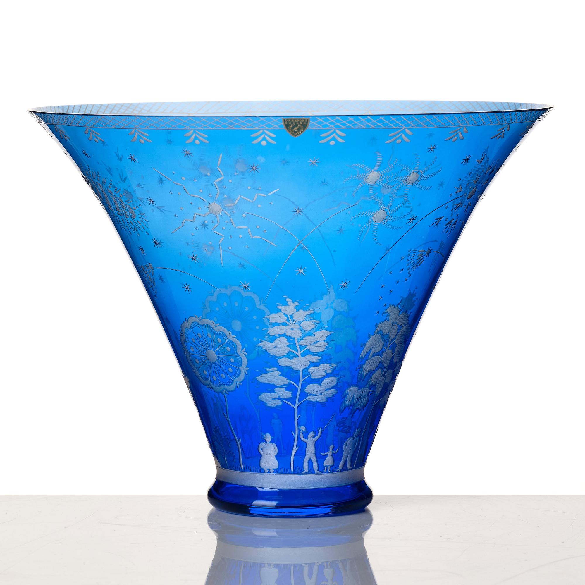 Edward Hald, an engraved blue glass "Fyrverkeriskålen" glass bowl, Orrefors 1957, engraved by Karl Rössler.