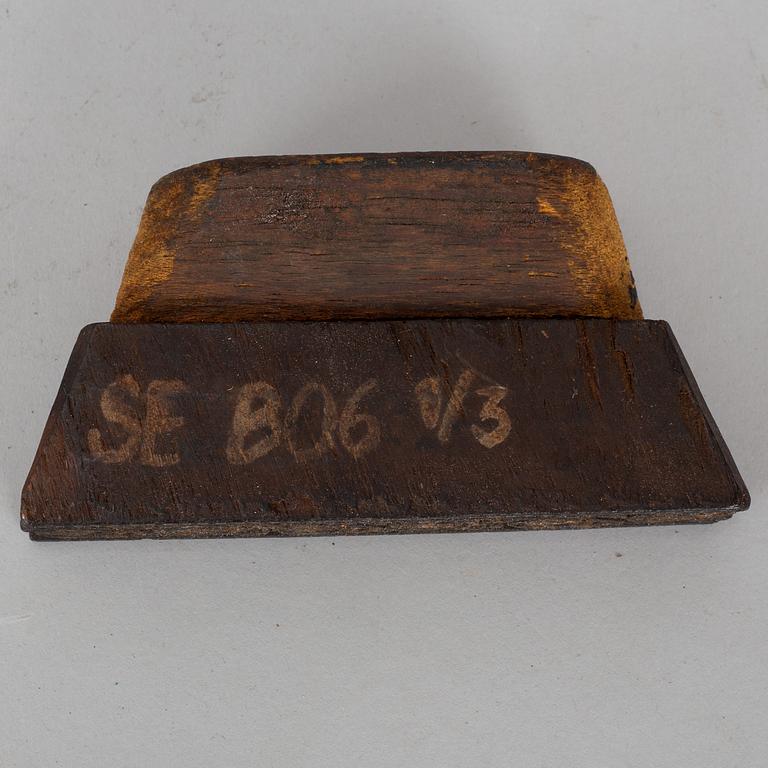 An 18th century wall paper stamp.