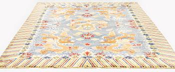 A semi-antique chinese ' Five dragon' silk carpet, c 335 x 254 cm.