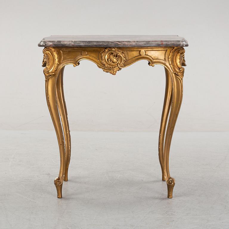 A rococo style table, around 1900.