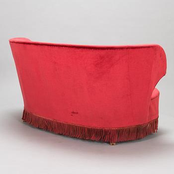 A mid-20th -century sofa and armchair.