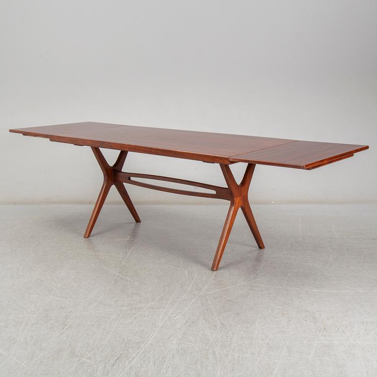 A mid 20th Century dinner table.