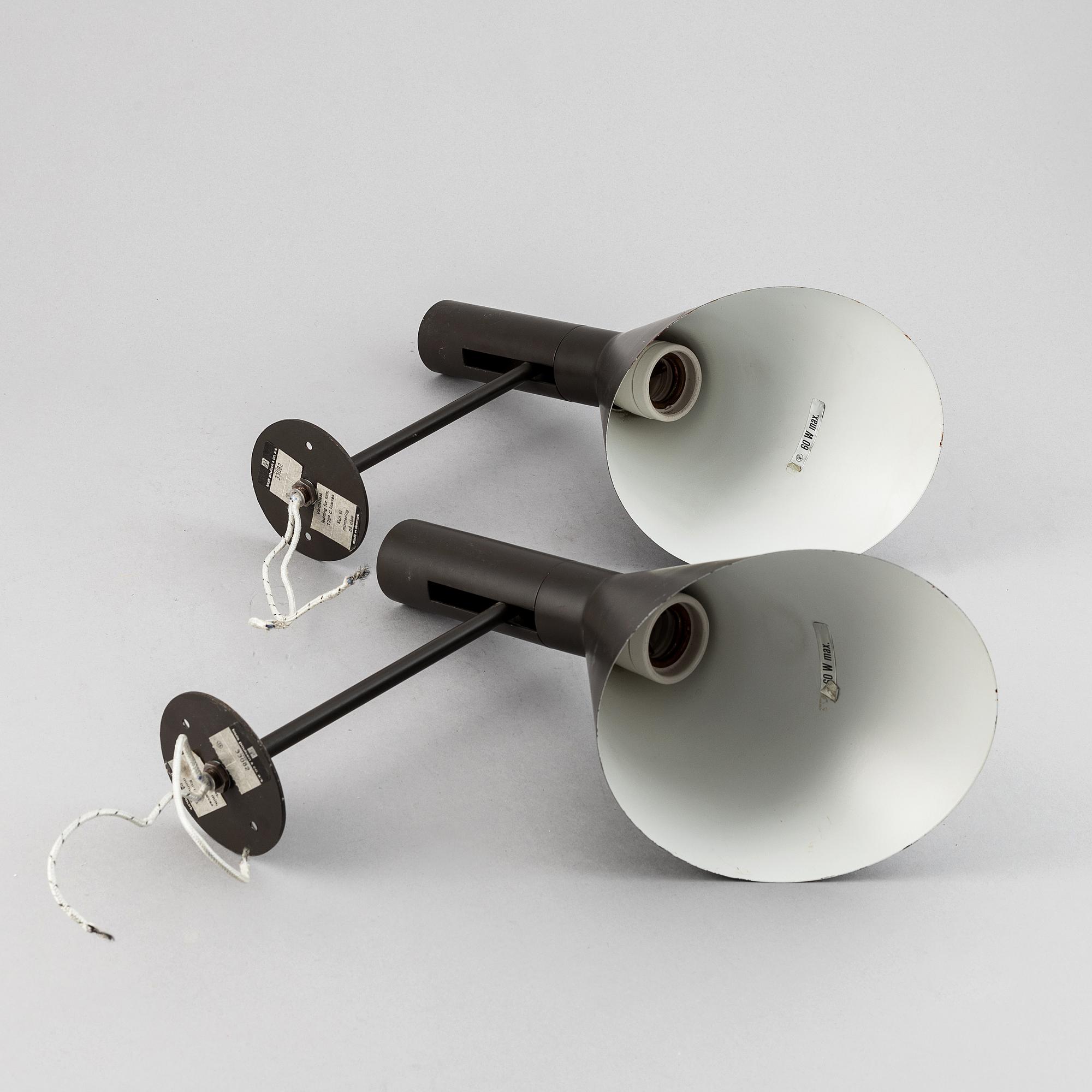 Arne Jacobsen, a pair of 'AJ'-wall lights, Louis Poulsen, Denmark, designed 1959.