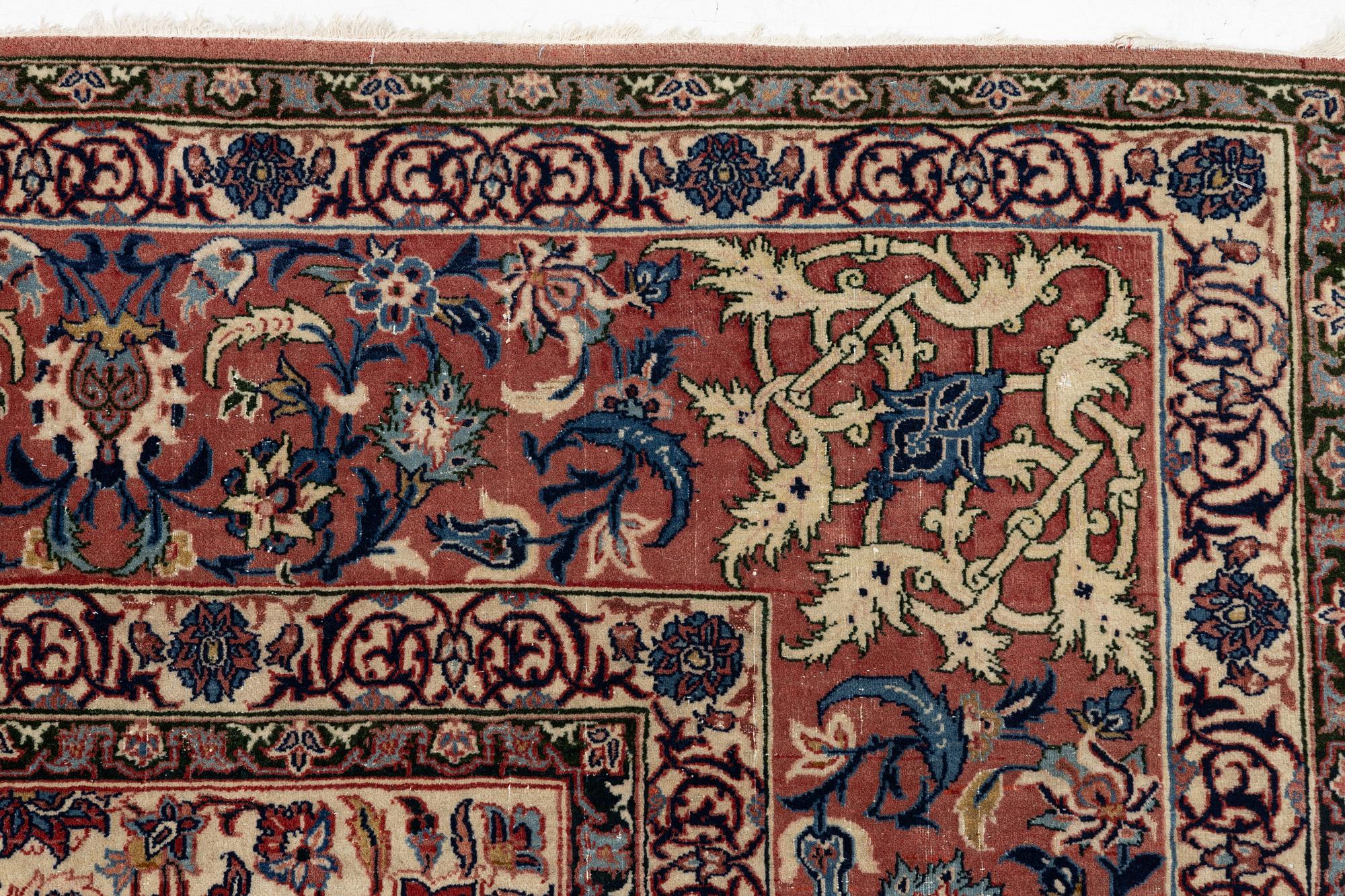 A semi-antique Isfahan carpet, central Iran, c. 325 x 210 cm.