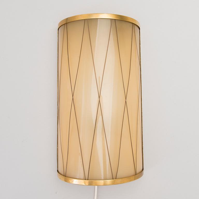A mid 20th century '3061' wall light for Stockmann Orno, Finland.