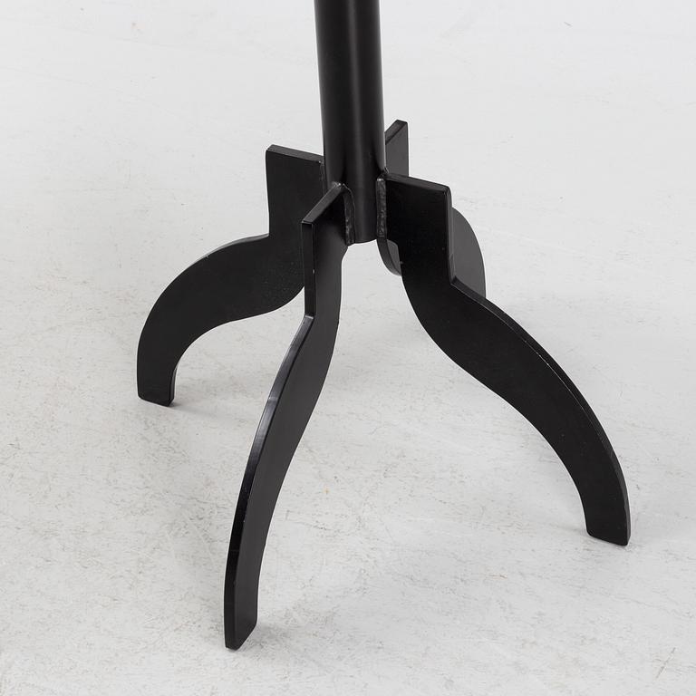 A 'Triptyk' table with an iron stand by Jonas Bohlin for Källemo, 1989.