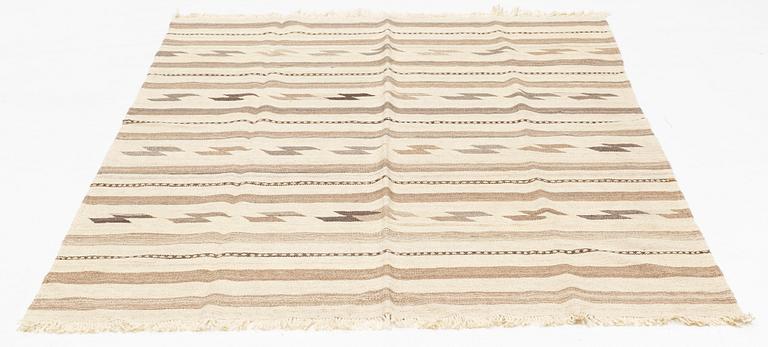 A kilim rug, approximately 245 x 162 cm.