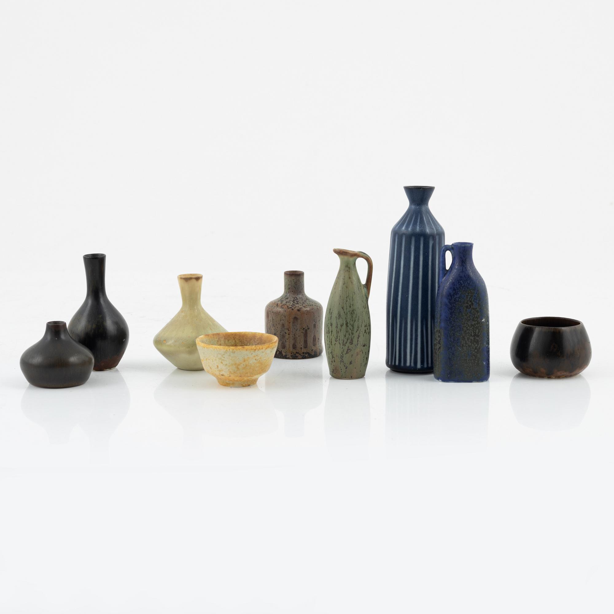 Carl-Harry Stålhane, a group of eight stoneware vases and Gunnar Nylund, a stoneware vase, Rörstrand.