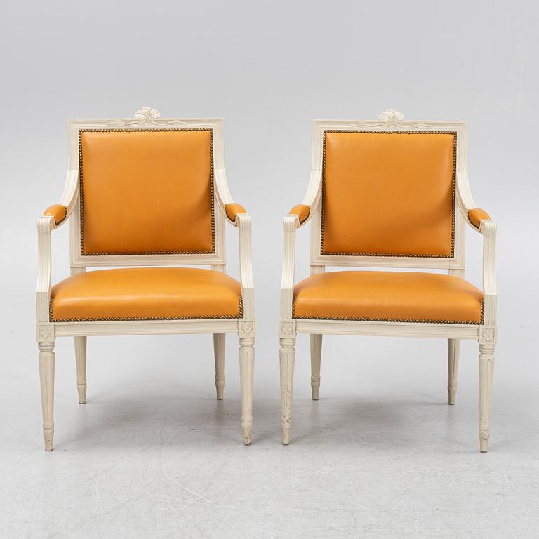 A pair of Gustavian style armchairs, end of the 20th Century.