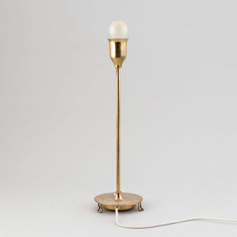 A model 2552 brass table lamp by Josef Frank for Firma Svenskt Tenn.