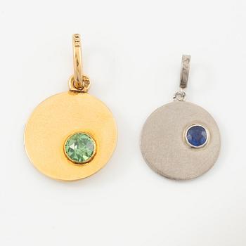 Two pendants in 18K gold and white gold.