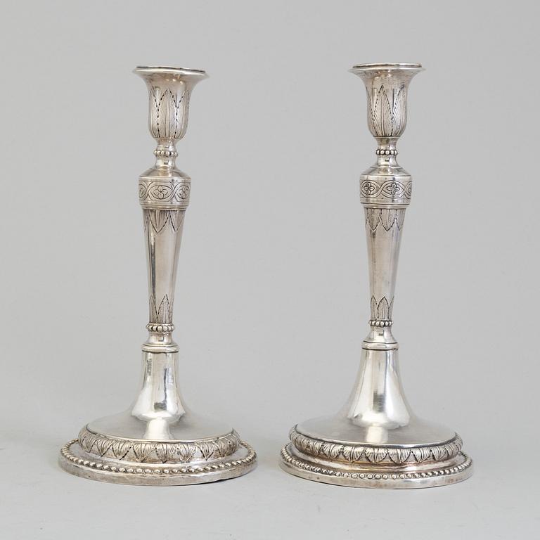 A pair of Italian early 19th century candlesticks, mark of Naples 1804.