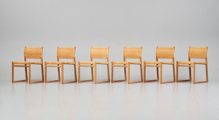 Børge Mogensen, a set of six oak and rattan 'BM61' chairs and a pair of BM62, Fredericia, Denmark, 1950s.