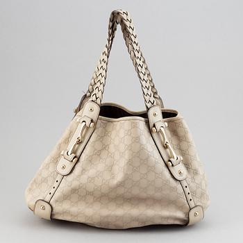 Gucci, leather bag.