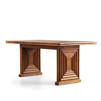 Oscar Nilsson, attributed to, a stained beech dining table, probably executed at Isidor Hörlin AB, Stockholm, 1930-40's.