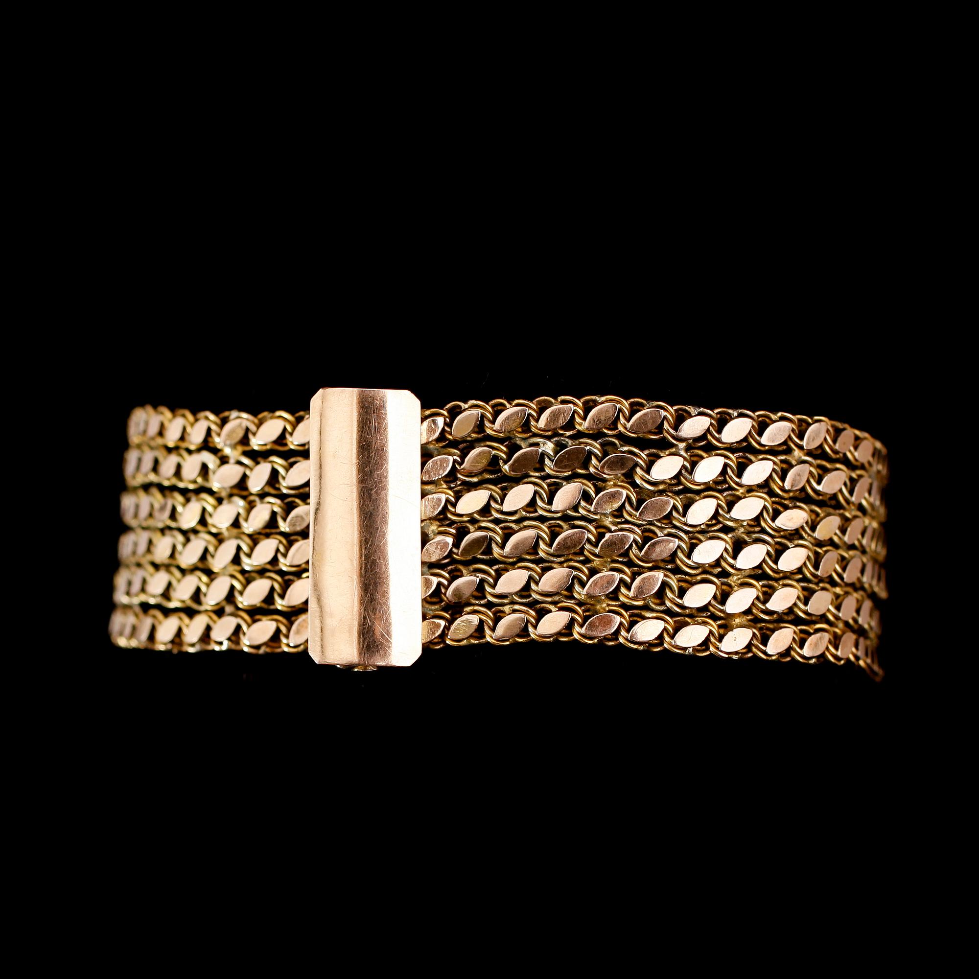 ARMBAND, 18 och 14 k guld. Vikt ca 32 g.