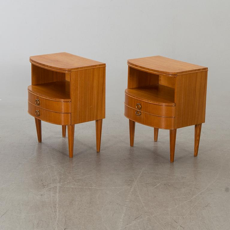A pair of bedside tables from the mid 20th century.