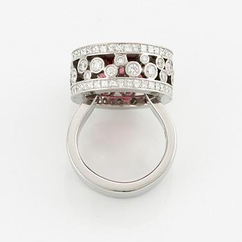 A Gaudy platinum ring set with a faceted tourmaline.