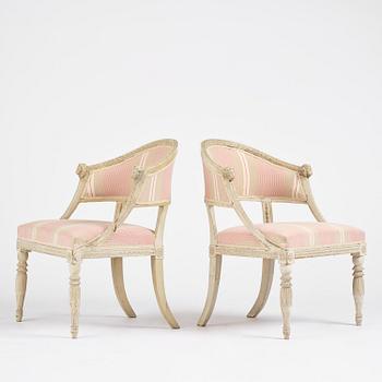 A pair of late Gustavian open.back armchairs, Stockholm, late 18th century.