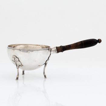 A silver pan with handle, central Europe, 18th century.