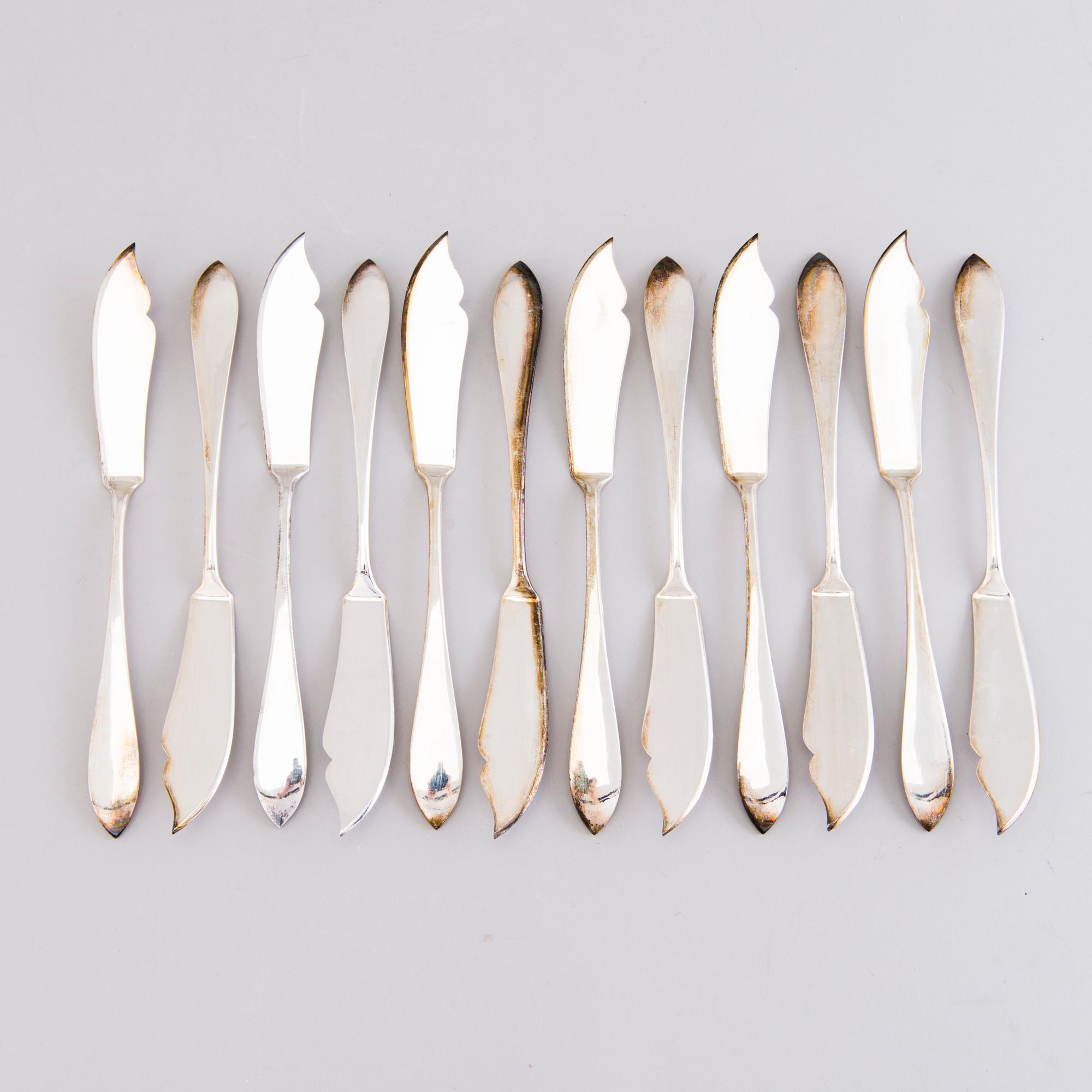A 1920s 88-piece set of silver cutlery and 12 knife handles, Warsaw Poland.
